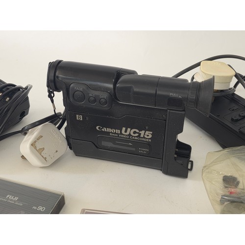 62 - Canon UC15 8mm Video Camcorder in Camera Carry Bag with accessories to include power leads and batte... 