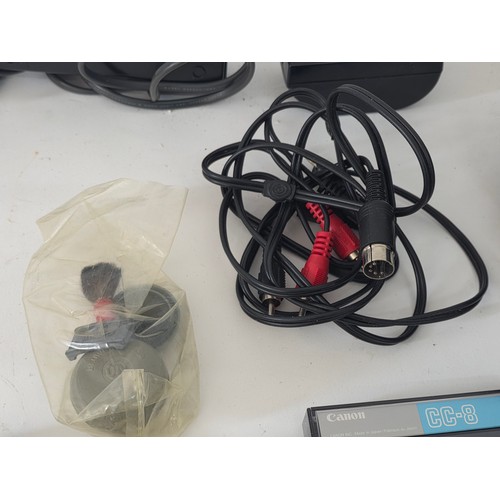 62 - Canon UC15 8mm Video Camcorder in Camera Carry Bag with accessories to include power leads and batte... 