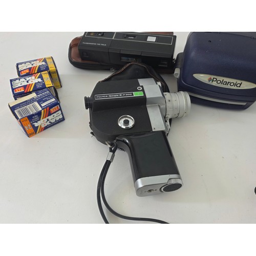 63 - A fujica single 8 P300 Cine Camera, a Polaroid Instamatic, a Halina STB, an non brabded camera, 3 ro... 