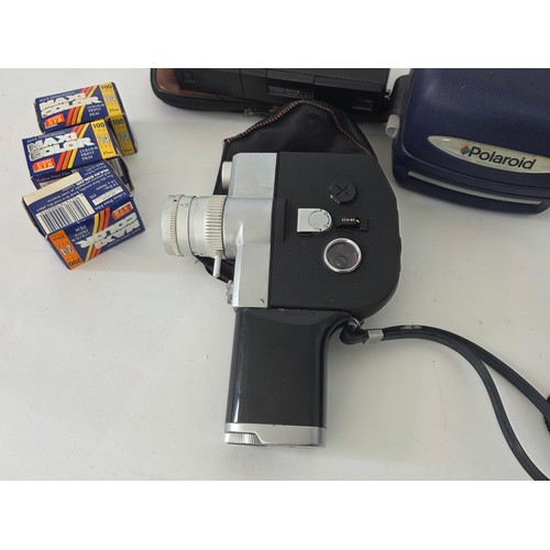 63 - A fujica single 8 P300 Cine Camera, a Polaroid Instamatic, a Halina STB, an non brabded camera, 3 ro... 