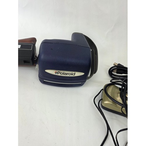 63 - A fujica single 8 P300 Cine Camera, a Polaroid Instamatic, a Halina STB, an non brabded camera, 3 ro... 