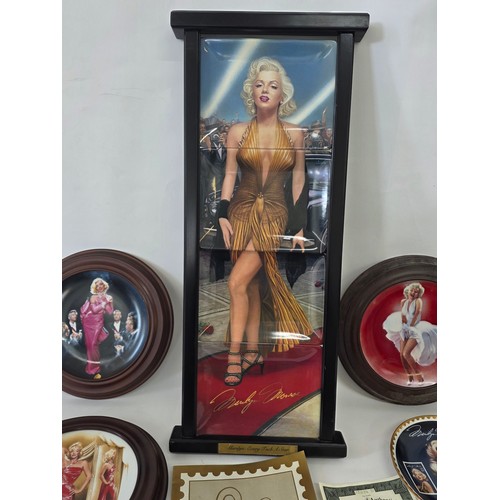 64 - Marilyn Monroe, a quantity of collector plates including a 4 plate framed Every Inch a Star set from... 
