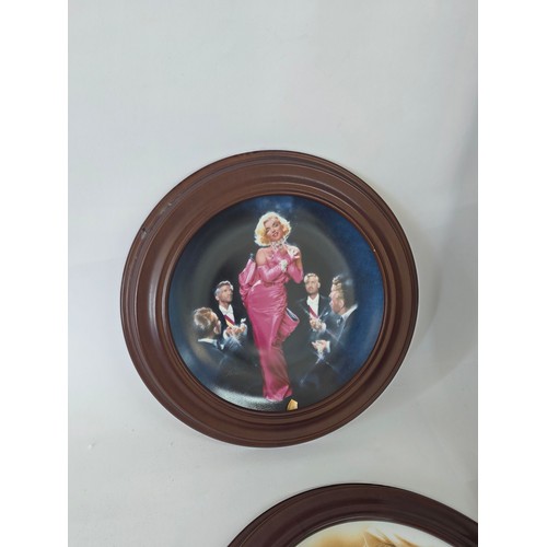 64 - Marilyn Monroe, a quantity of collector plates including a 4 plate framed Every Inch a Star set from... 