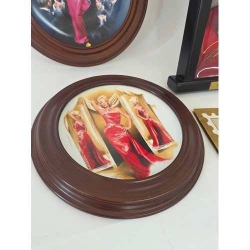 64 - Marilyn Monroe, a quantity of collector plates including a 4 plate framed Every Inch a Star set from... 