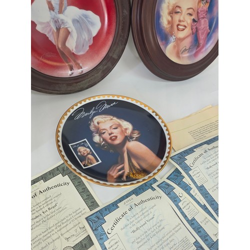 64 - Marilyn Monroe, a quantity of collector plates including a 4 plate framed Every Inch a Star set from... 
