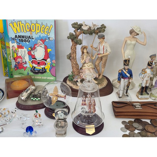 72 - A good mixed lot of collectables to include Swarovski crystals, a clock depciting sa Rolls Royce, Gl... 