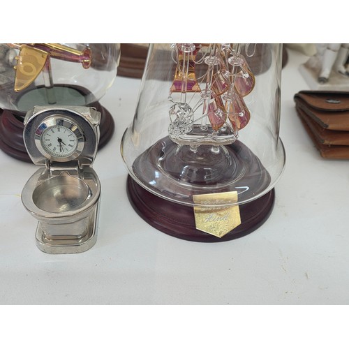 72 - A good mixed lot of collectables to include Swarovski crystals, a clock depciting sa Rolls Royce, Gl... 