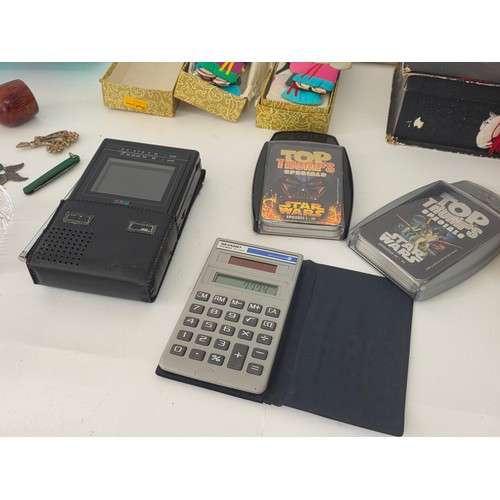 74 - A good mixed lot of collectables to include boxes, pipes, playworn cars, A Citizen TC53 pocket colou... 