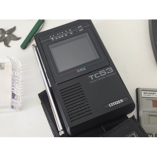 74 - A good mixed lot of collectables to include boxes, pipes, playworn cars, A Citizen TC53 pocket colou... 