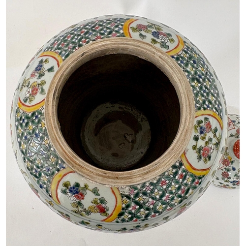 78 - A C17th style Chinese polychrome famille rose Ginger jar and coverThe base with a faux four characte... 