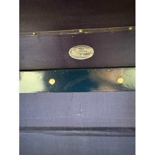 83 - A fine quality fitted travelling trunk, silk lined with 3 drawers, a hinged shoe box and wardrobe.&n... 