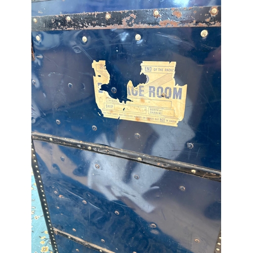 83 - A fine quality fitted travelling trunk, silk lined with 3 drawers, a hinged shoe box and wardrobe.&n... 