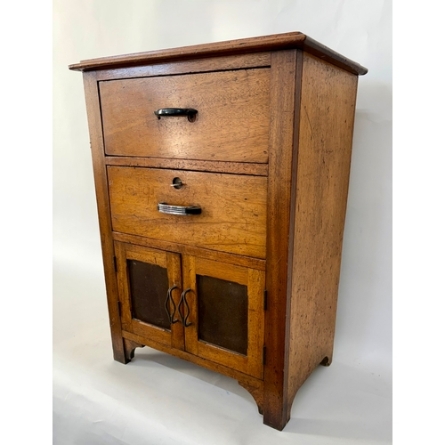 84 - An antique arts and crafts style solid walnut cabinet chestThe top with moulded edge, above two shor... 
