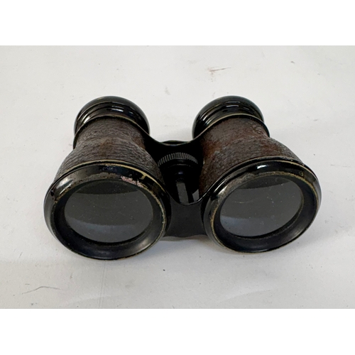 86 - Lumiere Army and Navy opera glass style binoculars,&nbsp; in original leather case.2