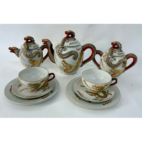 87 - A late 19th century Japanese Kutani dragon and Geisha girl egg shell porcelain part tea service.Comp... 