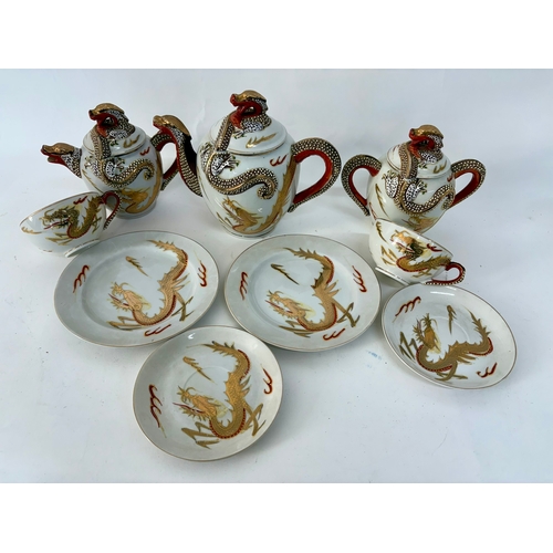 87 - A late 19th century Japanese Kutani dragon and Geisha girl egg shell porcelain part tea service.Comp... 