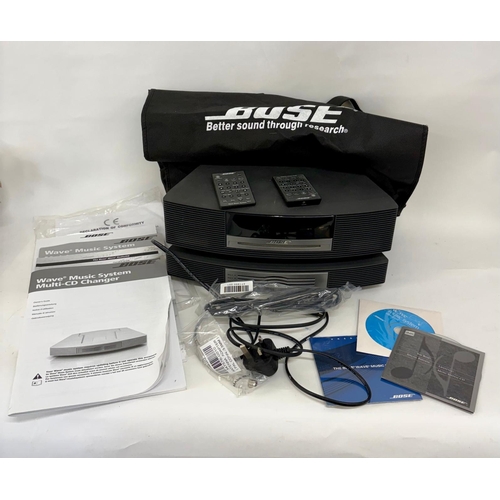 89 - A Bose Wave Music System, with a Wave Music System Multi-CD Changer.Together with cabling, manuals a... 