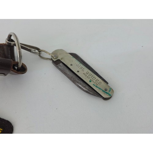 90 - Girl Guides Association. A mixed lot of 1950's Girl Guide items to include a Bukta made belt and buc... 