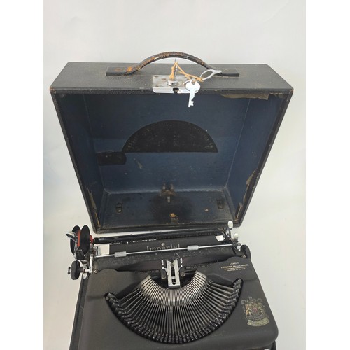 91 - Vintage Portable Typewriters. A Silver Reed Silverette hard case portable typewriter and an Imperial... 