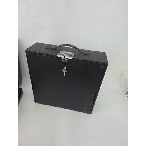 91 - Vintage Portable Typewriters. A Silver Reed Silverette hard case portable typewriter and an Imperial... 