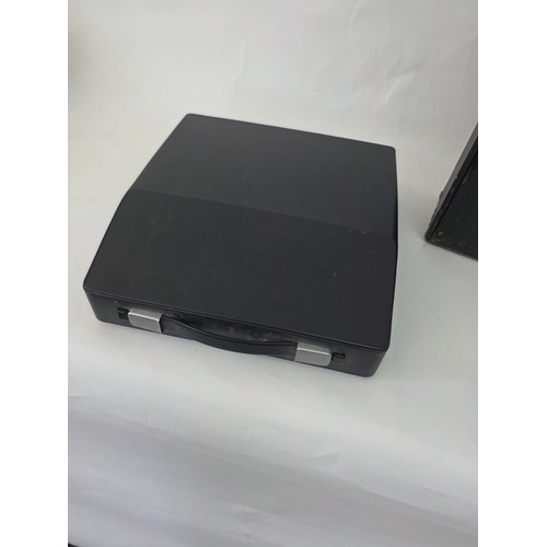 91 - Vintage Portable Typewriters. A Silver Reed Silverette hard case portable typewriter and an Imperial... 