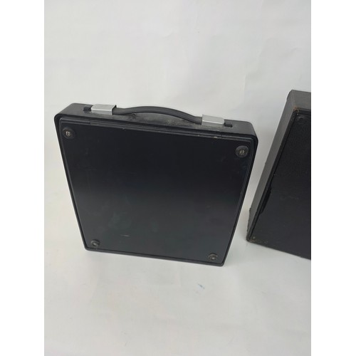 91 - Vintage Portable Typewriters. A Silver Reed Silverette hard case portable typewriter and an Imperial... 