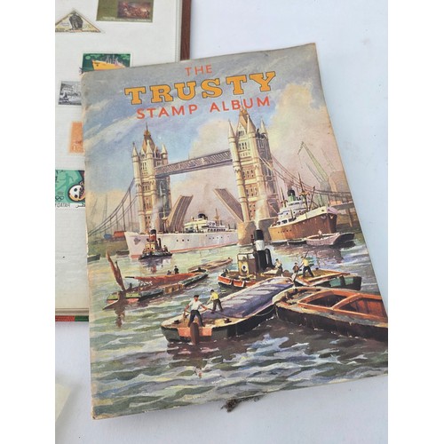 92 - Stamp Collecting. A mixed lot of vintage stamp albums and loose pages