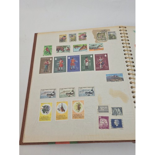 92 - Stamp Collecting. A mixed lot of vintage stamp albums and loose pages