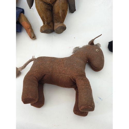 101 - Vintage Dolls, Teddies and stuffed toys to include a Norah Wellings sailor doll, a Golli, two articu... 