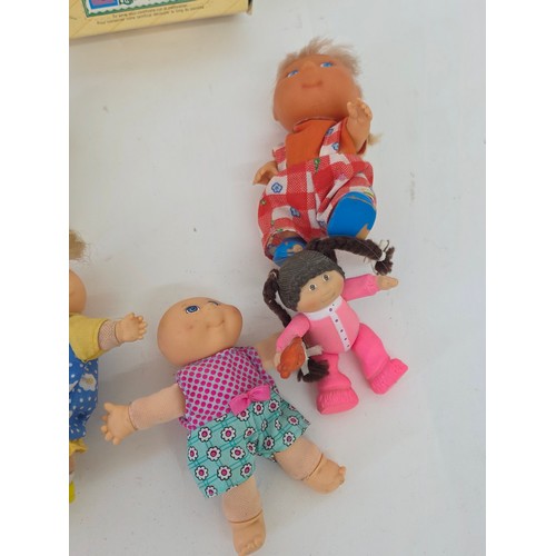 102 - Original Baby Cabbage Patch Dolls, a total of 12 some in their original retail packaging