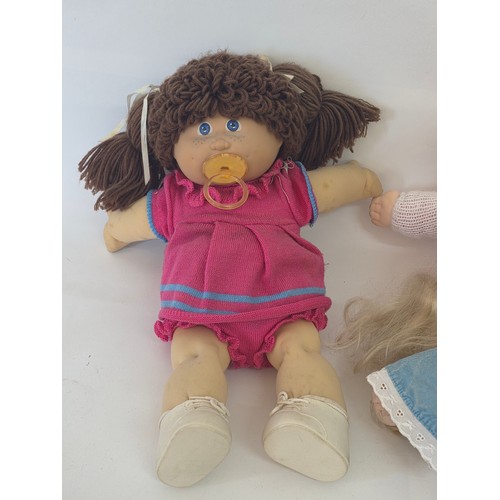 103 - Original Cabbage Patch dolls, a total of 6 with three birth certificates