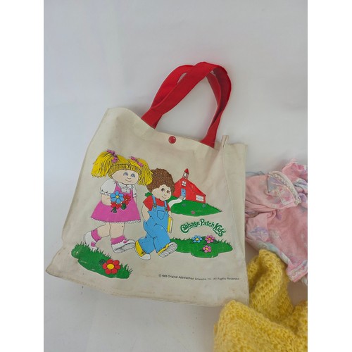 105 - Cabbage Patch Dolls, original 1980's Bag and assorted clothes