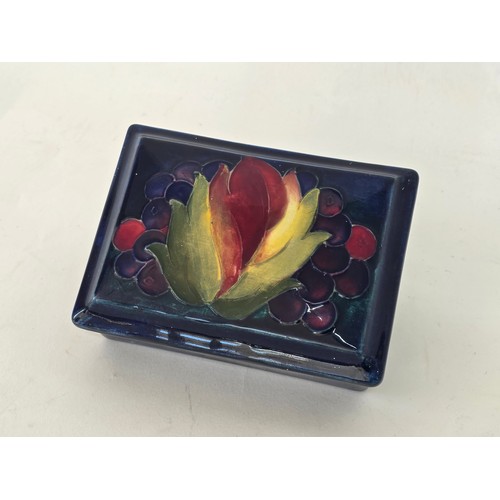 110 - William Moorcroft Leaf and Berry lidded trinket box 12cm (L) 9cm (W) 5cm (H)