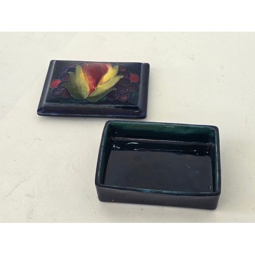 110 - William Moorcroft Leaf and Berry lidded trinket box 12cm (L) 9cm (W) 5cm (H)