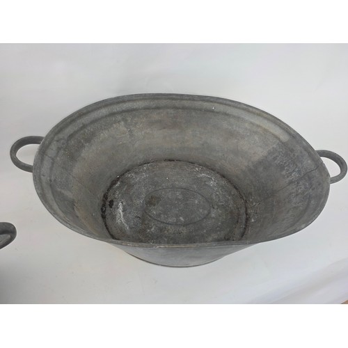 114 - A pair of vintage galvanised metal baths 63cm (L) 35cm (W) 22cm (H)