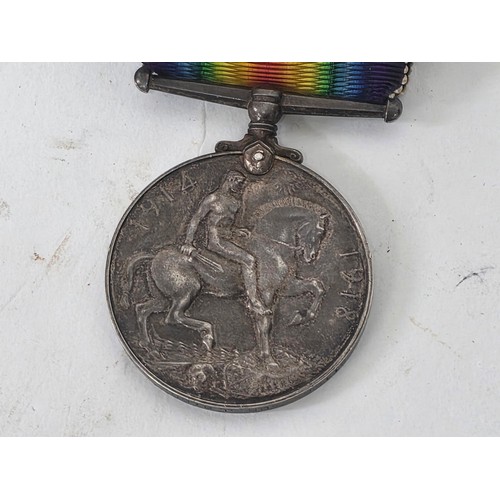 244 - Of WWI Interest.A group of items including a pair to 211265 SPR. J. Bird R.E., a Royal Engineers but... 
