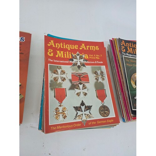 245 - Guns, Weapons & Militaria and Antique Arms & Militaria Magazines. A total of 60