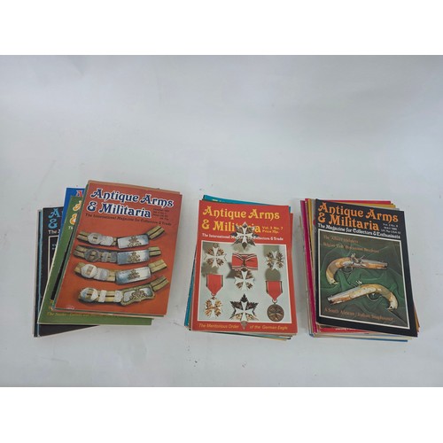 245 - Guns, Weapons & Militaria and Antique Arms & Militaria Magazines. A total of 60