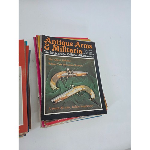 245 - Guns, Weapons & Militaria and Antique Arms & Militaria Magazines. A total of 60