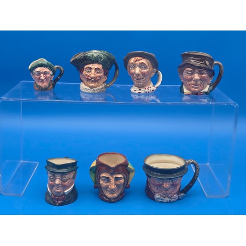 Royal Doulton small Character Jugs. A total of seven to include Auld Mac, The Cavalier, Jarge, Paddy, Mr Pickwick, Jester and Tony Weller