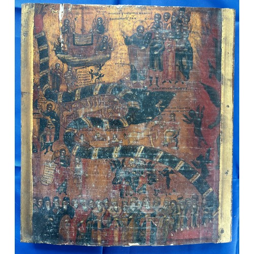 A 19th century Russian Orthodox wooden Icon, possibly depicting the Last Judgement. The Sin Serpent winding banner to the center represents the toll-houses of the fiery stream of sins. The Hand of God weighing the sins, above him Moses stands holding the Tablets of Law, while an orderly row of the righteous of the land-the Bishops, Saints and the faithful line up to enter paradise.