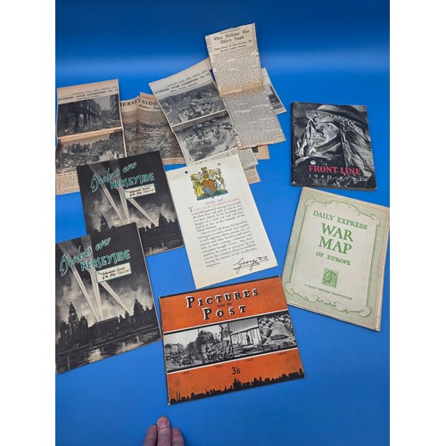 A rare victory message to all schoolchildren leaflet from King George and a collection of WWII books and newspaper cuttings