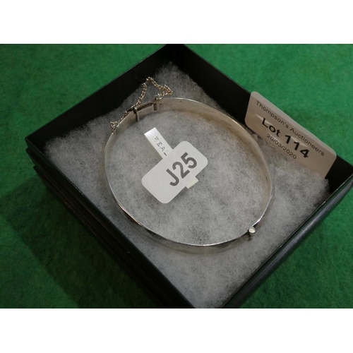 114 - Silver bangle with safety chain