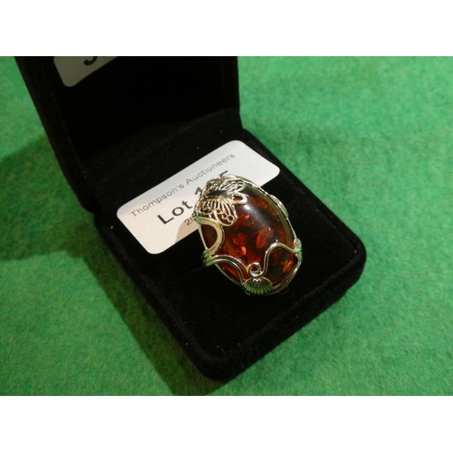 125 - Silver and Amber ring