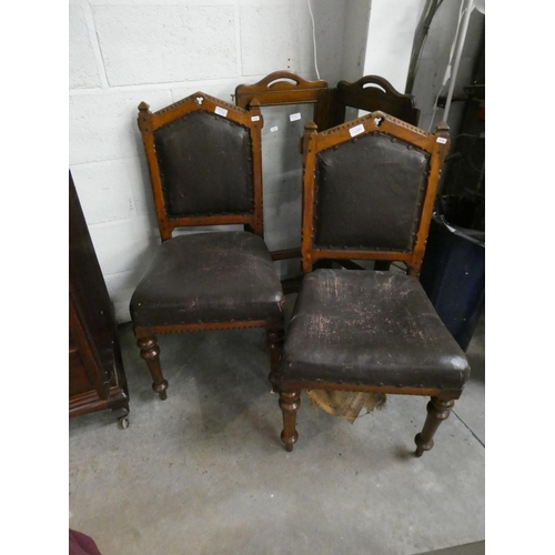 425 - Pair of  oak hall chairs & a two fold fire screen