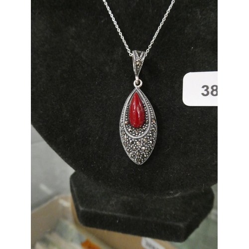 66 - Silver & marcasite pendant on a silver chain