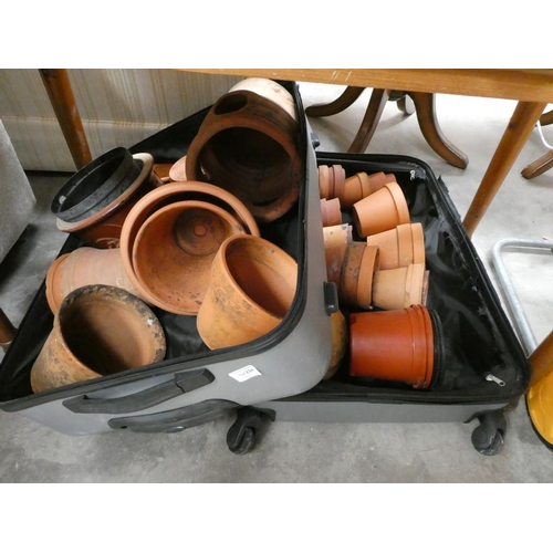 234 - Suitcase of terracotta pots