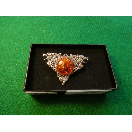 381 - Silver & amber brooch