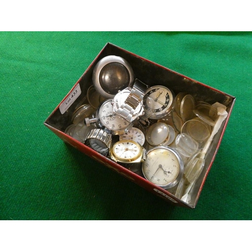 433 - Tin of mainly watch/pocket watch glasses, 2 Ingersol pocket watches, Smiths stopwatch, pocket watch ... 