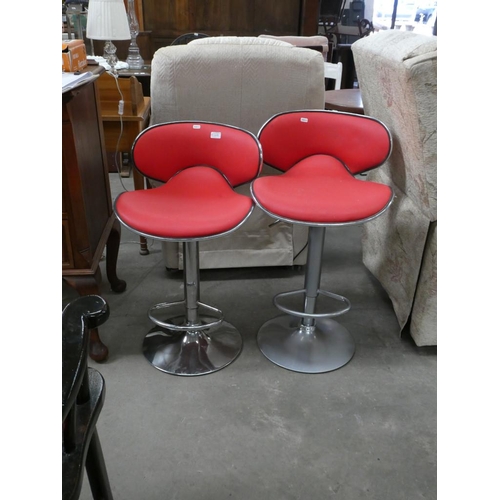 91 - Pair of red retro chrome stools